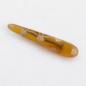 Floral Carved Apple Juice Lucite Cigar-Shaped Brooch